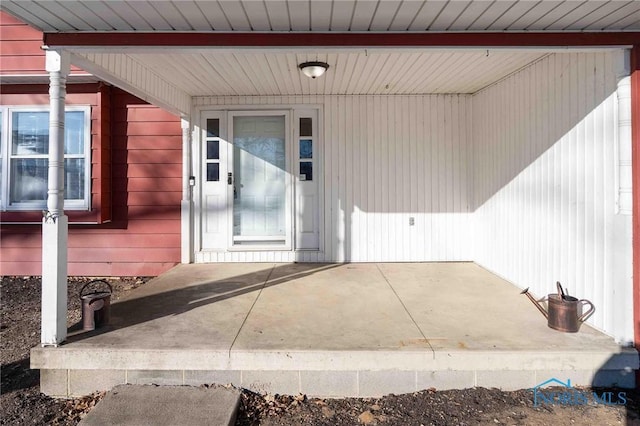 property entrance with a patio