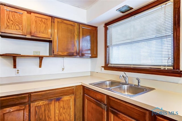 kitchen featuring sink and a healthy amount of sunlight