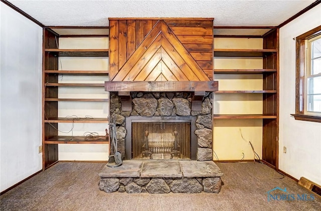 unfurnished living room with carpet floors, a textured ceiling, and a stone fireplace