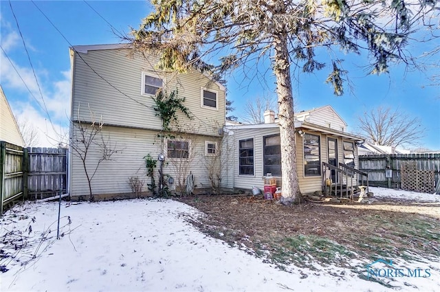 view of snow covered property