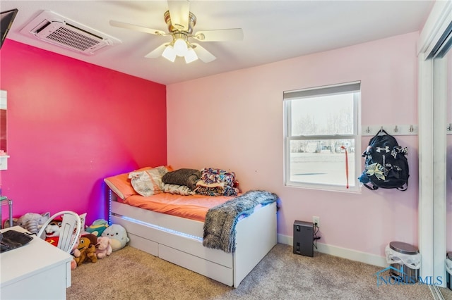 bedroom featuring ceiling fan and light carpet