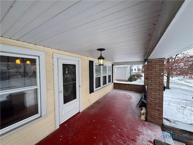 view of snow covered patio