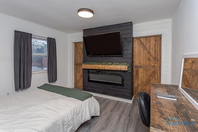 bedroom featuring dark hardwood / wood-style floors