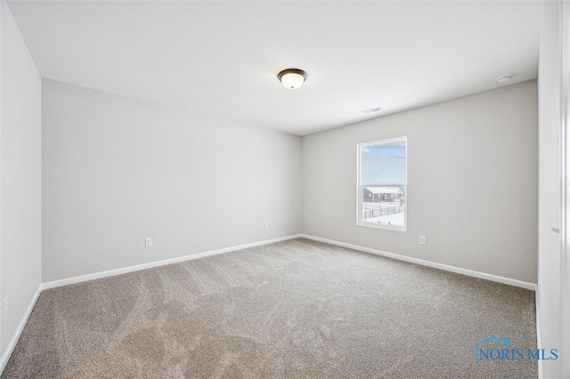 empty room with carpet floors