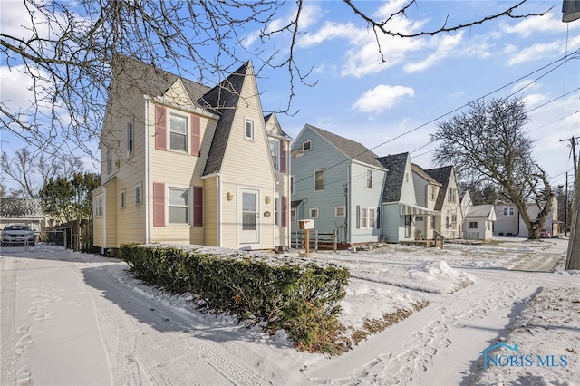 view of snow covered house