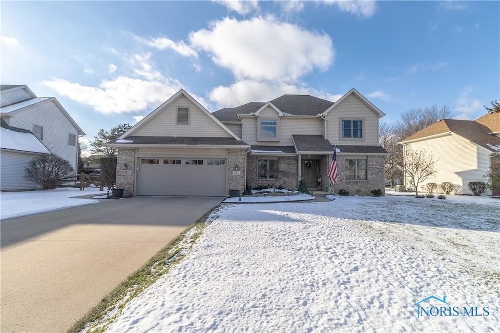 view of front of home with a garage