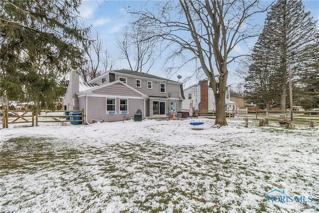 view of snow covered property