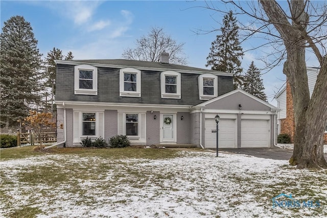 view of front of property featuring a garage