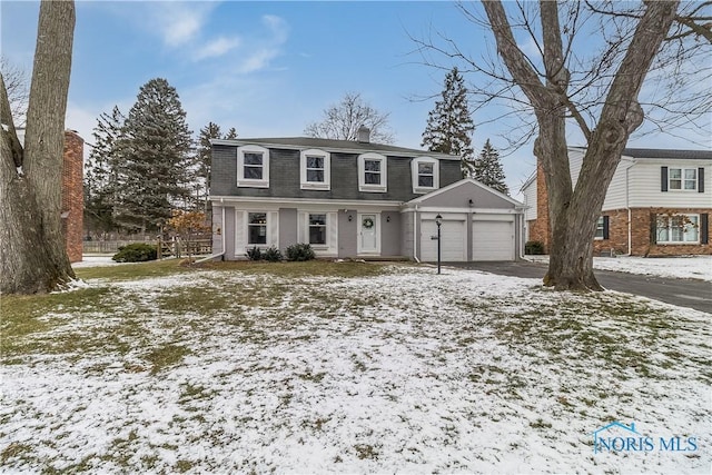 front of property featuring a garage