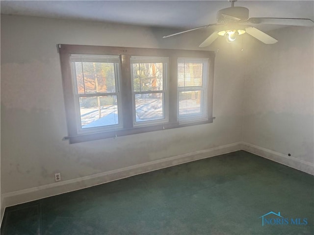 bonus room with ceiling fan and carpet floors