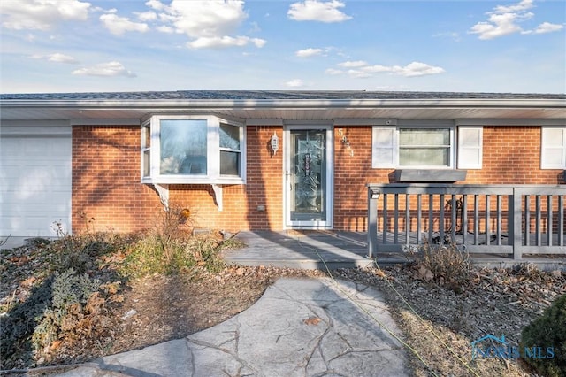 property entrance featuring a garage