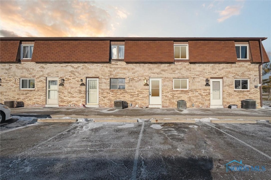 view of front of property with central AC