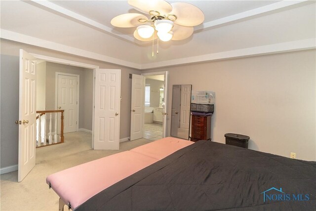 carpeted bedroom with ceiling fan