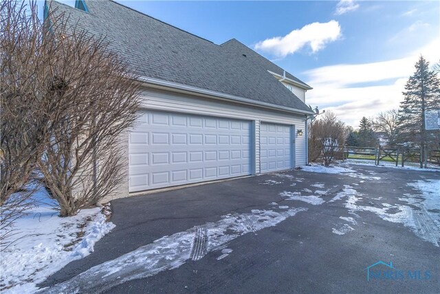 view of snow covered garage