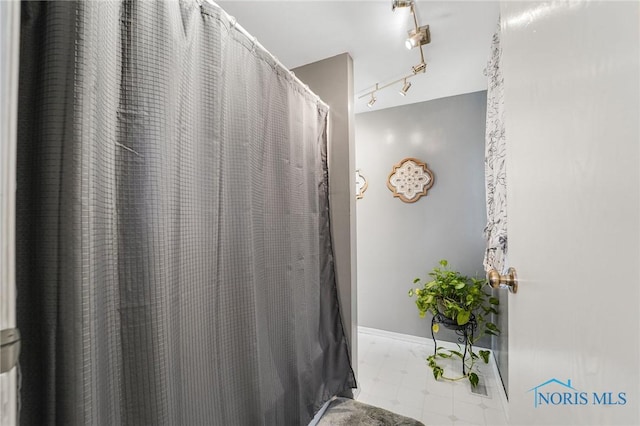 bathroom with rail lighting