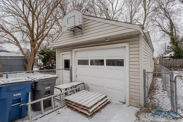 view of snow covered garage