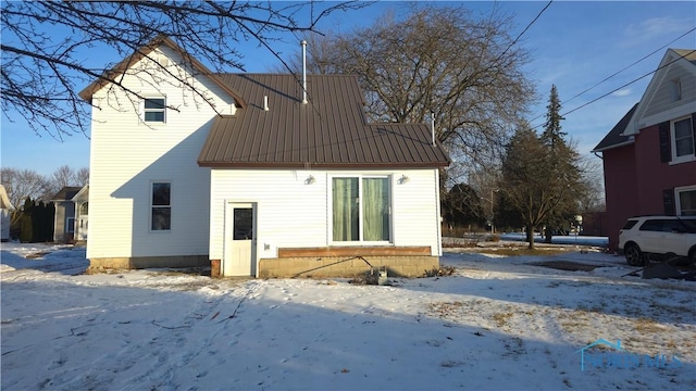 view of snow covered house