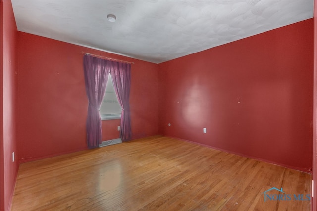 empty room featuring light wood-type flooring