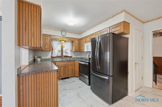 kitchen featuring sink and stainless steel appliances