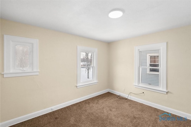 view of carpeted spare room