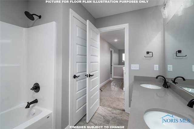 bathroom featuring vanity and tub / shower combination