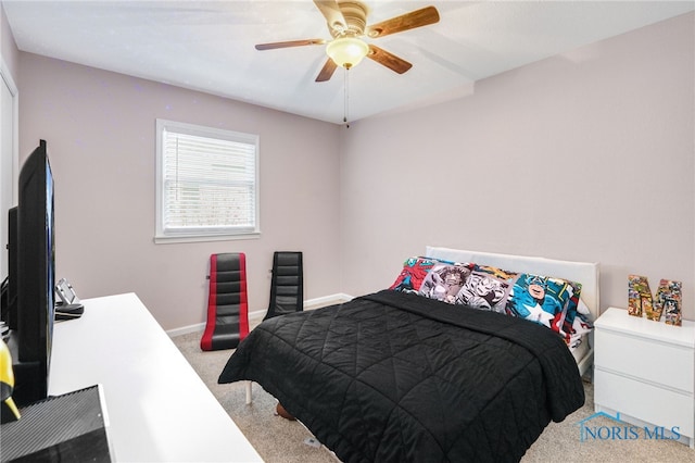 carpeted bedroom featuring ceiling fan