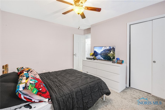 carpeted bedroom featuring ceiling fan