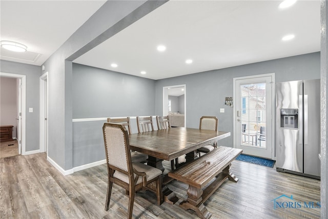 dining room featuring light hardwood / wood-style floors