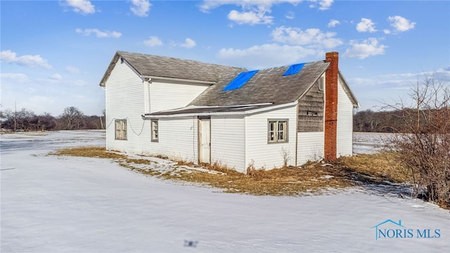 view of snowy exterior