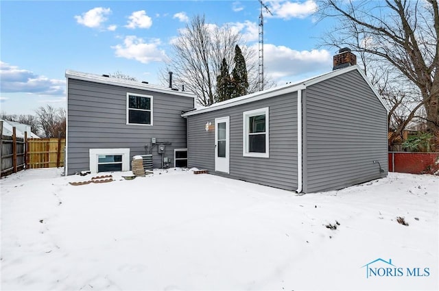 view of snow covered property