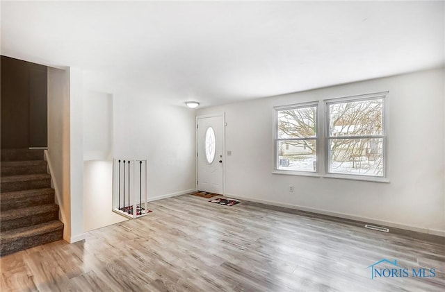 entrance foyer featuring light hardwood / wood-style flooring