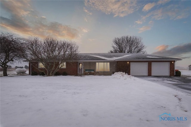 ranch-style house with a garage