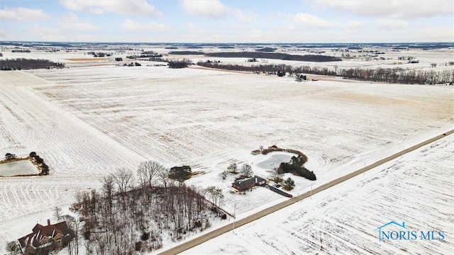 snowy aerial view with a rural view