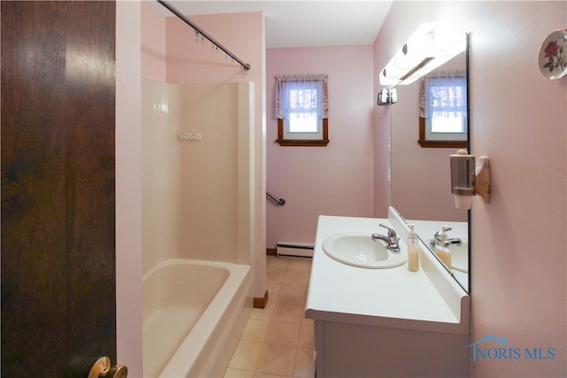 1318 E 4th St, Marblehead, OH 43440 - bathroom with vanity, a baseboard radiator, tile patterned floors, and a wall mounted air conditioner