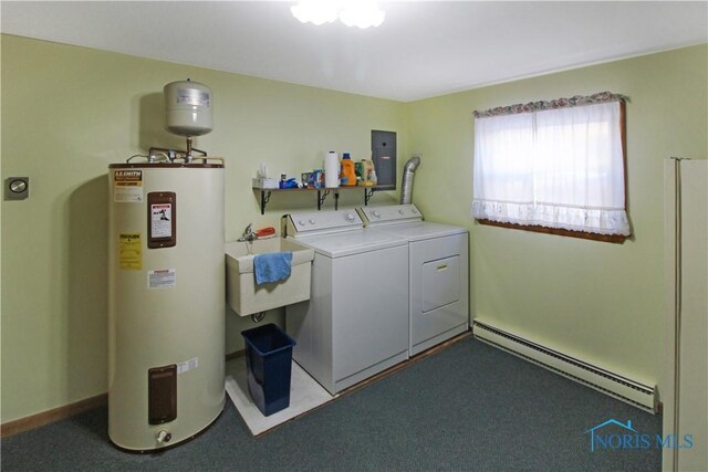 1318 E 4th St, Marblehead, OH 43440 - washroom with laundry area, washing machine and dryer, baseboard heating, electric water heater, and a sink