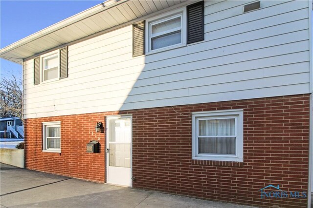 1318 E 4th St, Marblehead, OH 43440 - exterior space with brick siding