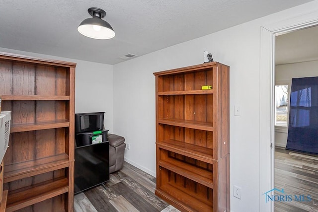 interior space with hardwood / wood-style flooring