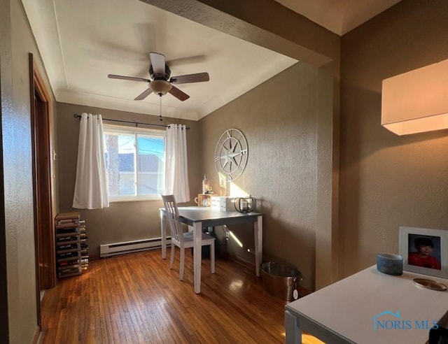 dining space with ceiling fan, baseboard heating, and dark hardwood / wood-style flooring