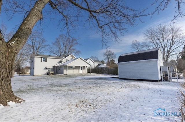 exterior space featuring a storage unit