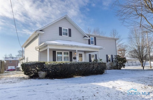 view of front of home with central air condition unit and a porch