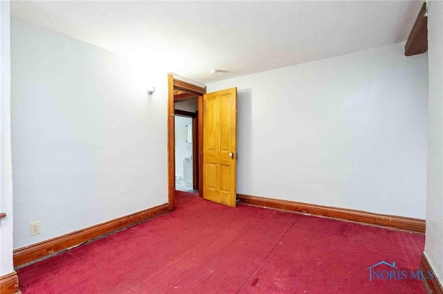 view of carpeted spare room