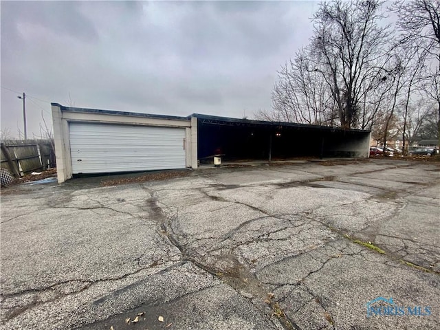 garage with a carport