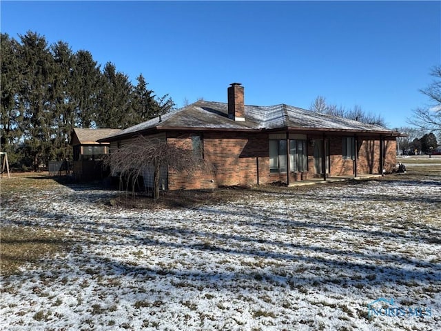 view of snow covered property