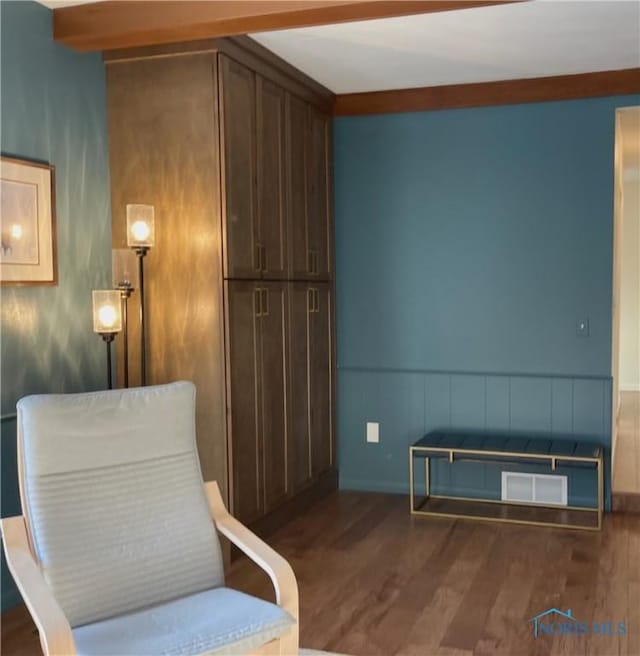 sitting room with dark hardwood / wood-style floors