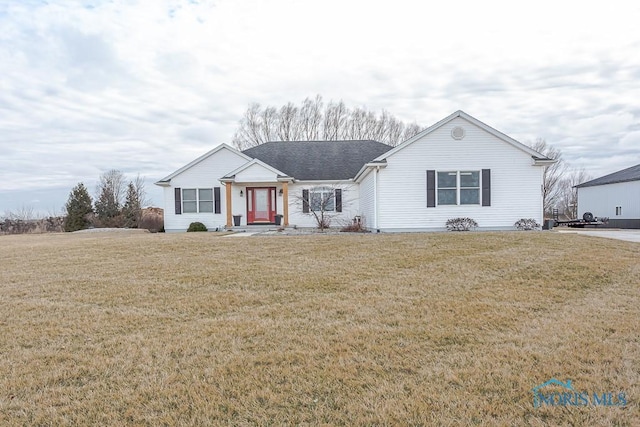 single story home with a front lawn