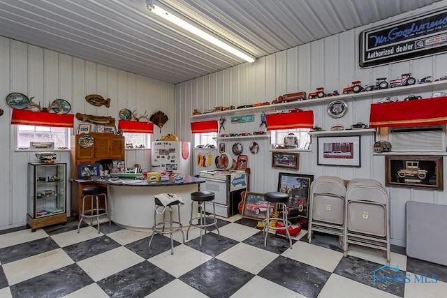 interior space with white appliances and white cabinets