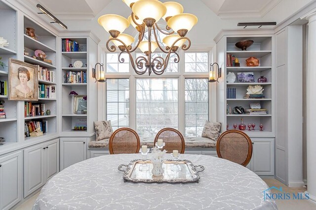 dining room with a notable chandelier