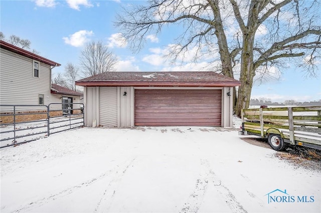 view of snow covered garage