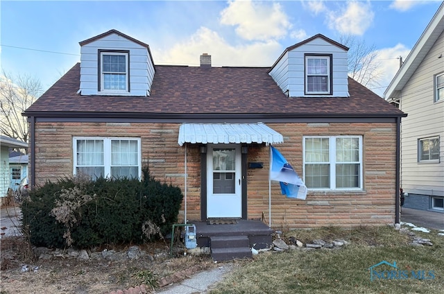 view of cape cod-style house