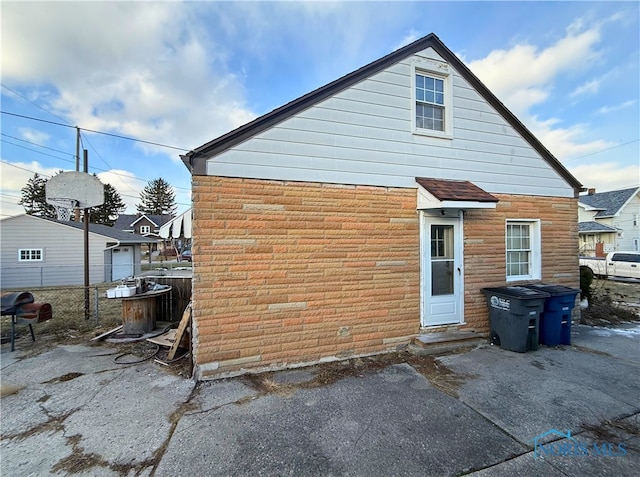 rear view of house with a patio